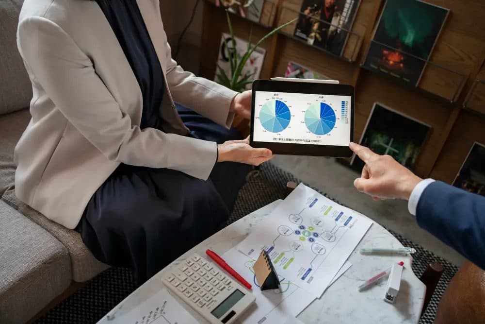 Business advisors reviewing growth and performance analytics together